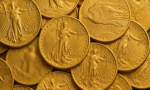 pile of saint gaudens gold coins